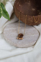 Collier ARTISANE pendentif noix de coco