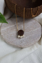Collier ARTISANE pendentif noix de coco