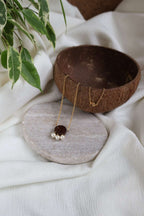 Collier ARTISANE pendentif noix de coco