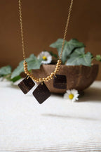 Collier chaîne et pendentifs en noix de coco - RITUEL
