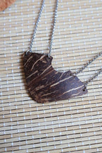 Collier en acier inoxydable et noix de coco - PLASTRON